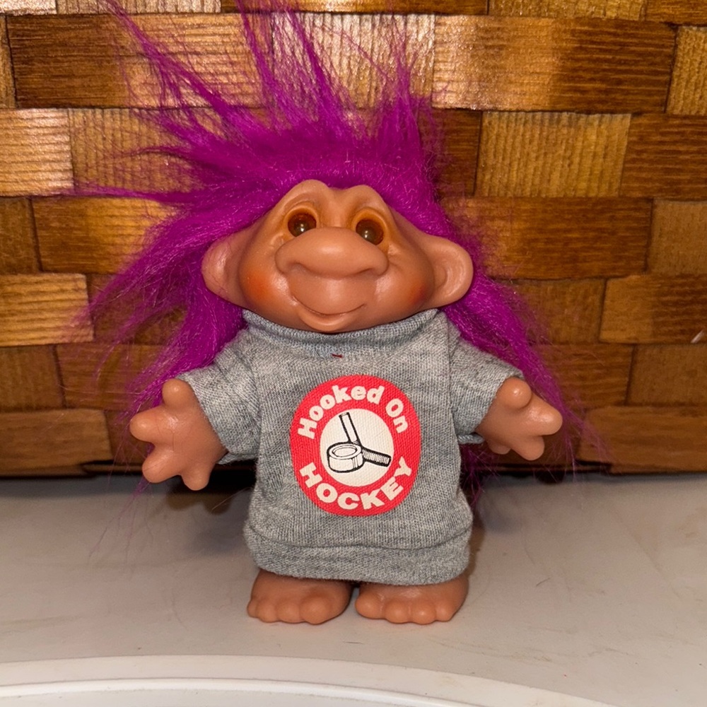 Vintage 1986 DAM 4.5” Troll Doll Purple hair “Hooked on hockey” shirt